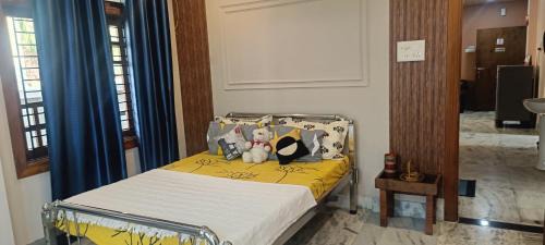 Sualkuchi Apartment | Riverside Palm Luxe 2BHK with AC in both bedrooms near Kamakhya & IHR
