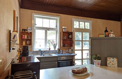 Baekern House | Romantic country idyll - former inn with large garden, fireplace, near the forest and lake
