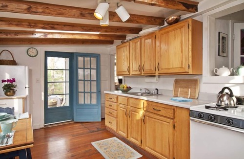 Woodstock Cottage | Romantic + historic artist cottage with storybook charm in private woods!