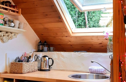 Saint Asaph Cottage | Romantic Stone Cottage with private woodfired hot tub, spa bathroom, yoga deck!