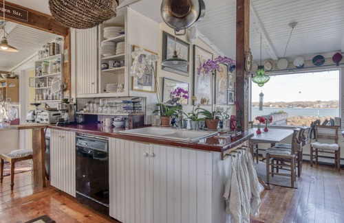 Sag Harbor Bed & Breakfast | Room 1 queen bed on waterfront + bikes and kayaks