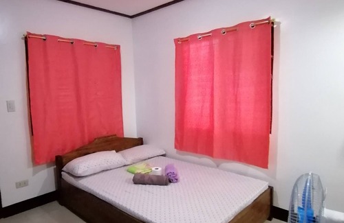 Port Barton House | Room#1 with Terrace 5 min walk to the Beach and to the Town center.