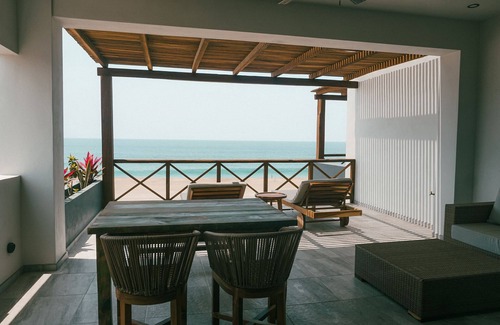 Isla Navidad Apartment | ROOM 6- Romantic 1 Bedroom Ocean Front Condo