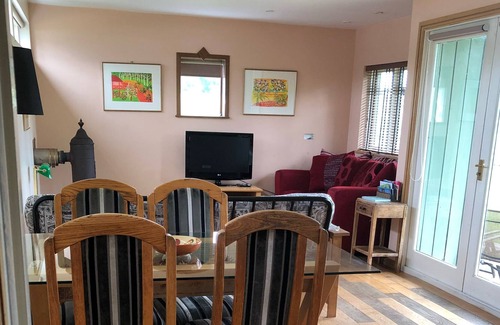 Benson Ski Chalet | Rural self-catering lodge.South-facing sun deck, garden, views over open fields.