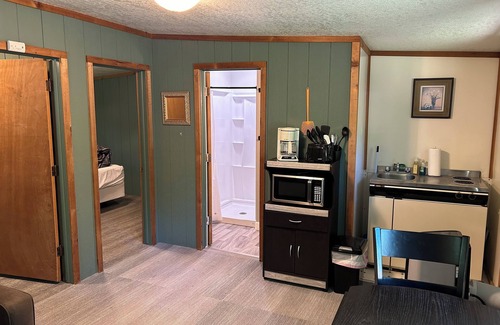 Palmyra Cabin | Rustic cabins in secluded campground with lake access and woods to wander in.