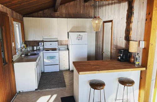 Nominingue Ski Chalet | Rustic chalet - directly on the lake with sandy beach
