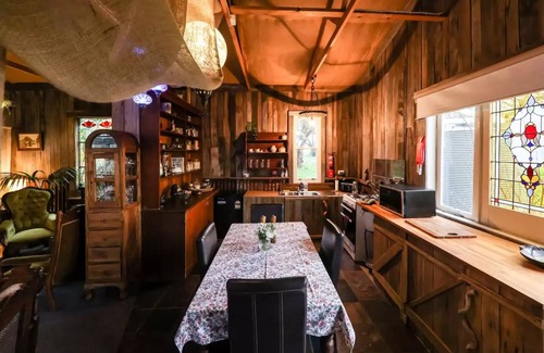 Kingston Apartment | Rustic cosy retreat, with library, fireplace, films and a Four Poster Bed.