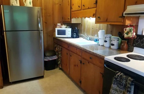 Northwest Ithaca Cottage | Rustic, Cozy Cottage with Backyard Waterfall and Cayuga Lake Views!