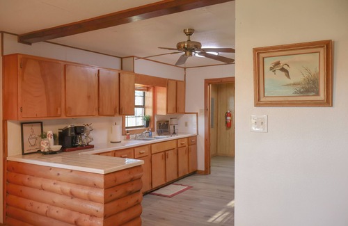 College Station House | Rustic Log Cabin Near Texas A&M – Spacious Retreat with Pond & Firepit!