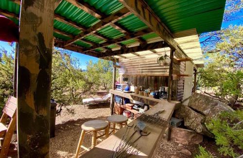 Zuzax House | Rustic Tree House Rental with a Fire Pit in Bernalillo County, New Mexico