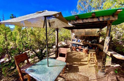 Zuzax House | Rustic Tree House Rental with a Fire Pit in Bernalillo County, New Mexico