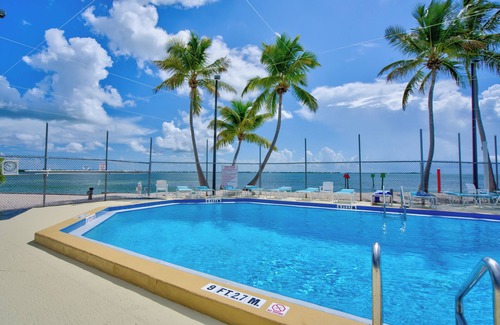 Cudjoe Key RV Rental | RV Lot 502 Venture Out, Located on a boating canal