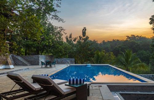 Suryamal Villa | SaffronStays Vedika - EcoFriendly villa by the River with Pool