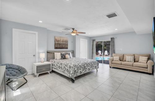 Willoughby Acres House | Salt Water Heated Pool Home with a Tiki Bar, a Garage Game Room and 4 Bikes