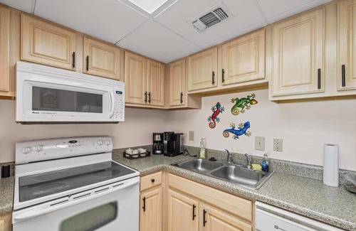 Villa Sabine Condo | Sand Dollar E111 – Bayfront Bliss in the Heart of Pensacola Beach