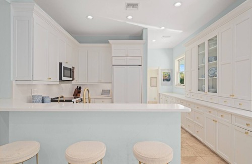 Shell Harbor House | Sanibel 6 bedroom Luxury Home with Pool,One Block from Beach,Pier and Canal View