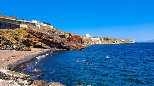 Imerovigli House | Santorini's Old Mill Serene Getaway by Pori Beach