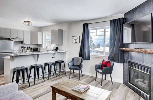 Harvie Heights Condo | Scenic Mountain Getaway with Hot Tub & Views