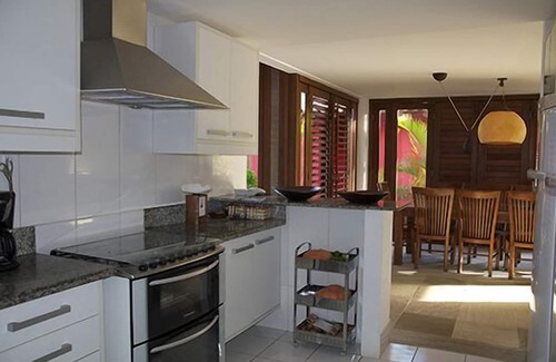 Sauipe Villa | Scenic Waterfront Villa - Overflow Pool & Tropical Landscape
