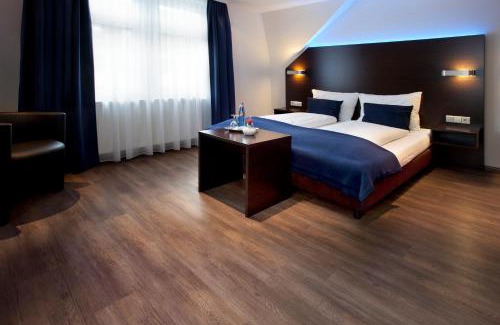 Grenzach-Wyhlen Bed & Breakfast | Schlotzeria Hotel I Café I Eis