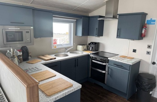 Porthcawl Cabin | Sea Front 2 Bedroom Lodge (Honeysuckle 95) at Trecco Bay Holiday Park, Porthcawl