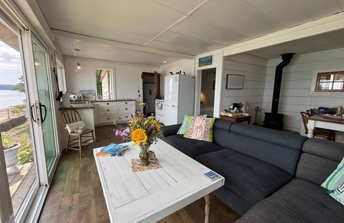 Lion's Head House | Seafari is a charming stone cottage on Georgian Bay with stunning bluff views, a flat rock shoreline, and a cozy bunkie. Perfect for relaxing, swimming, and exploring.
