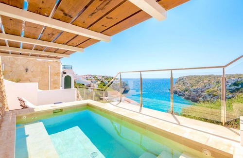 Cala en Porter Villa | Seafront Villa Bellavista with heated pool by DadoVillas