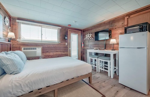 Ocean Bay Park Hotel | Seashore Condo Hotel #15, Cozy Fire Island Escape, Near Ferry - With Bay Views and Steps from the Beach.