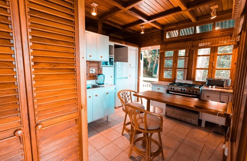 Parlatuvier Cottage | Secluded cottage with calming bay and rainforest views, 5 mins from the beach.