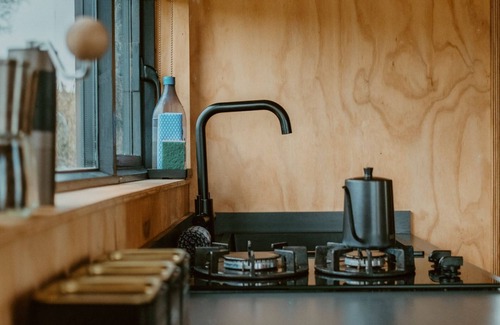 Cheshire West and Chester Cabin | Secluded Woodland Romantic Off-Grid Cabin With Firepit