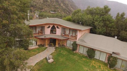 Melocoton Hotel | SEL Lodge - Aventura y Descanso