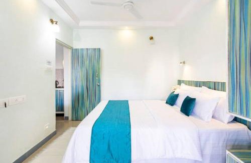 Colva Apartment | Serene Escape One Bedroom Apartment with AC, Wi-Fi, Gym and 5-Minute Walk to the Beach Cativating Tree and Garden Views
