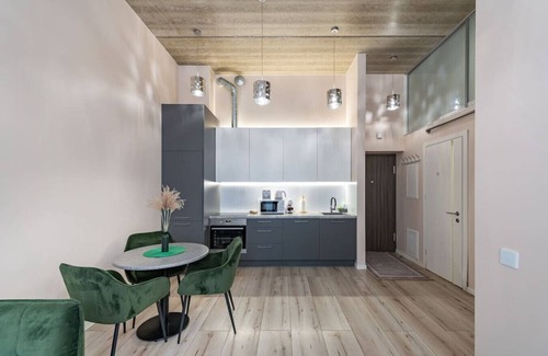 Kaunas Apartment | Shanti barracks apartment 2 by Polo Apartments