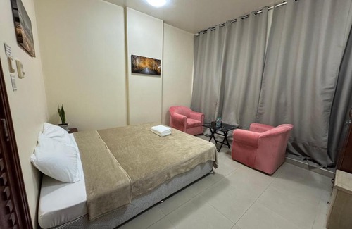 Al Ain House | Shared bath rooms only