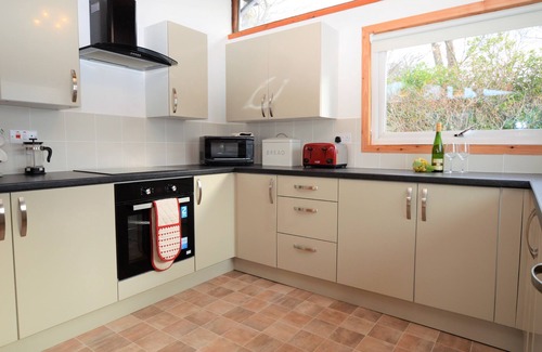 Tighnabruaich Ski Chalet | Shore front location on Loch Fyne, sleeps 4, log fire