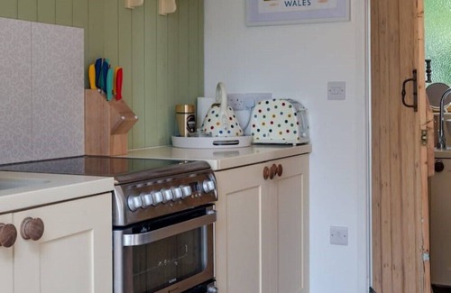 Halfway House House | Shrawardine Station Train Carriage sleeps 4 Fishing and Wild Swimming