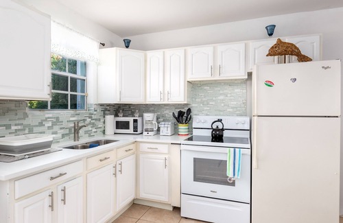 Leeward Settlement Cottage | Silver Palms # 2 – Exclusive Long Bay Beachfront Retreat with Pool