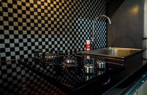 Panunggangan Utara Apartment | Simply Studio Room at Grand Serpong Apartment By Travelio