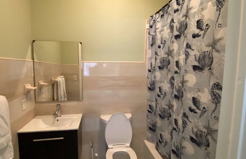 Nicholls Town Apartment | Single Spacious Bedroom Orange Unit