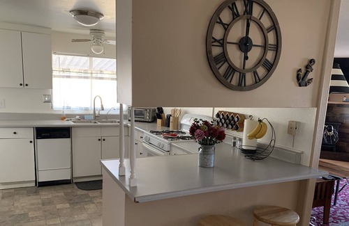 Bullhead City Cottage | Sits across the street from waterfront and up on a hillside with river view.