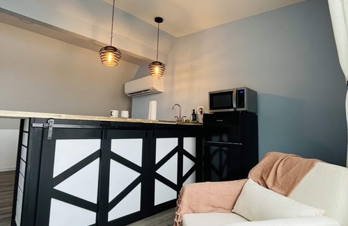 Aurora Condo | SKY Parlor sunrise and sunset views overlooking the river