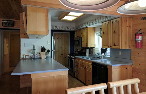 Hanna Cabin | Sleep over the river, and then wake up and fish it!