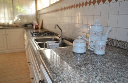 Ex Campo d'Aviazione Villa | Small house with fir garden
