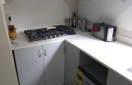 Cul de Sac House | Smart Luxury Stay: Modern 1BR Retreat with High-Tech Comforts