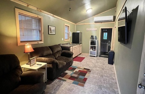 Matewan Cabin | SMUGGLERS RUN: Cozy Cabin, quick & easy access to Hatfield-McCoy trail heads.