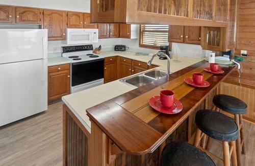Salvo House | Soundfront Dog Friendly Home w/Hot Tub, Tiki Bar, Easy Windsports Access