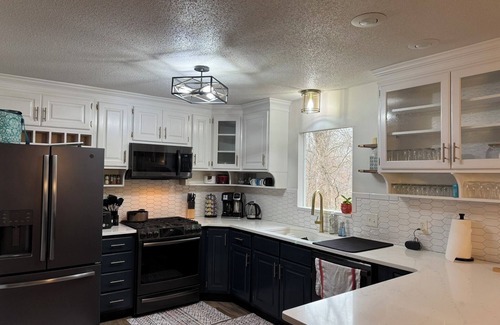 Columbia House | Spacious 4-bedroom house in vibrant Columbia close to the MKT trail with WiFi/AC