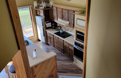 Mancelona Condo | Spacious 5 beds,2 full baths Golf, ski, Sleeps 6, KING bed, Wi-Fi close to Lakes
