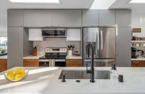 University Place House | Spacious 5BR/4BA: Water Views, Step-Free Main Level & Next to Chamber Bay Golf