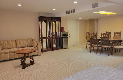 Saint-Laurent House | Spacious basement with indoor garage